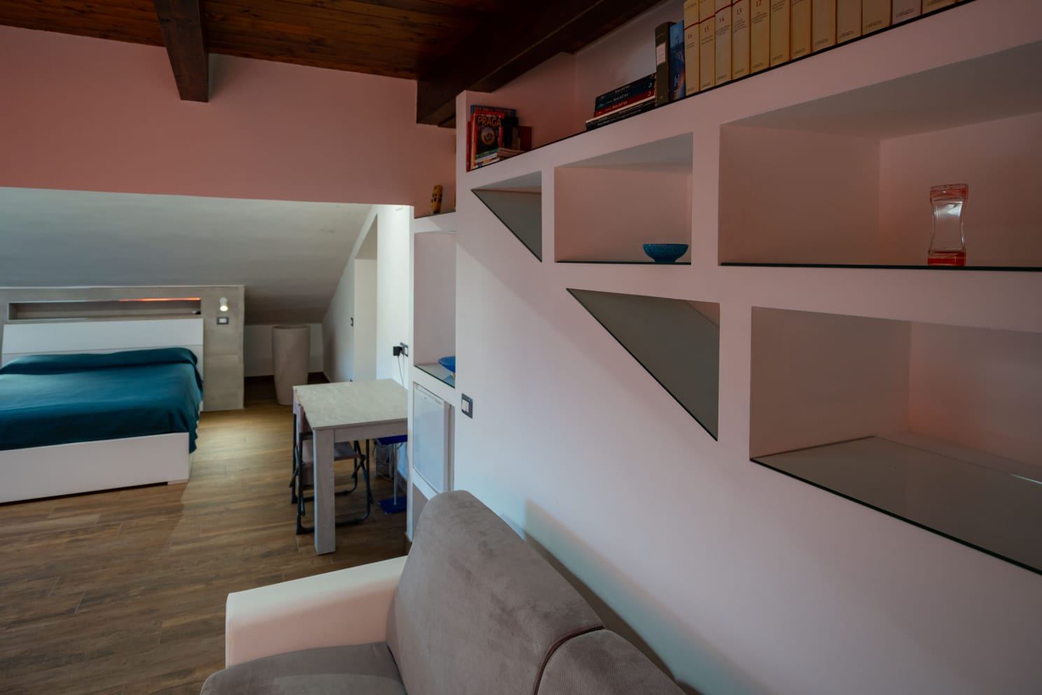 Europa Apartment: mezzanine with designer staircase and lounge